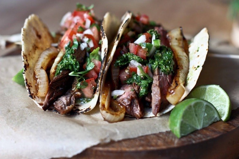 Grilled Flat Iron Tacos with Chimichurri and Burnt Spring Onion Crema